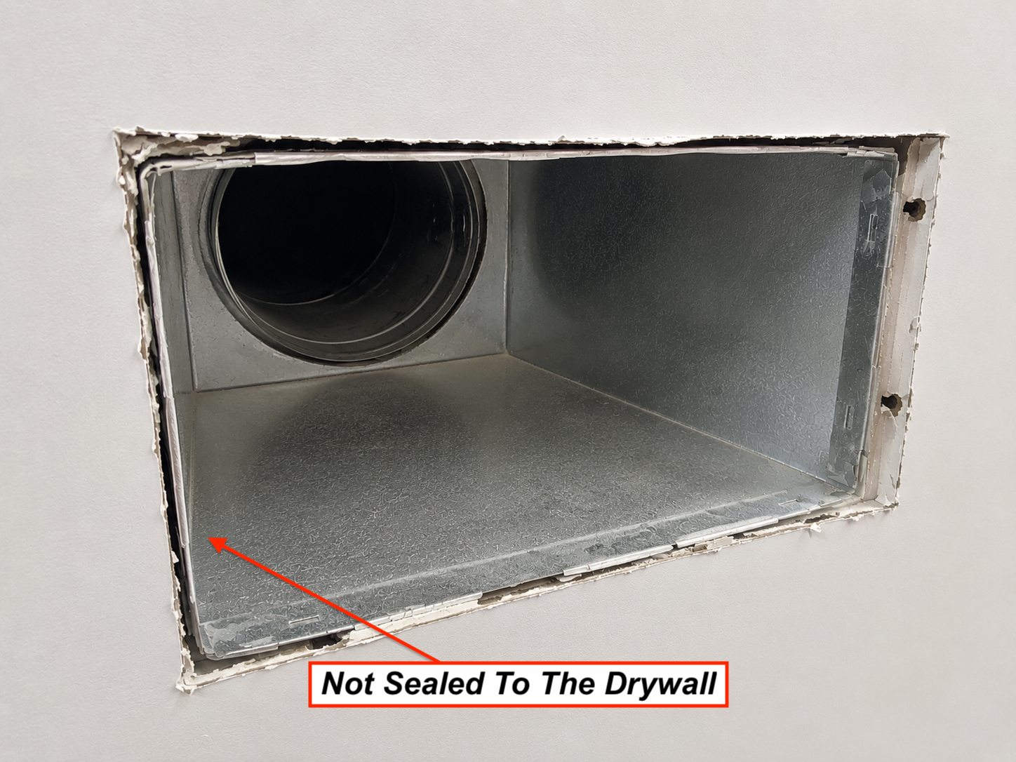 Supply boot not sealed to the drywall.